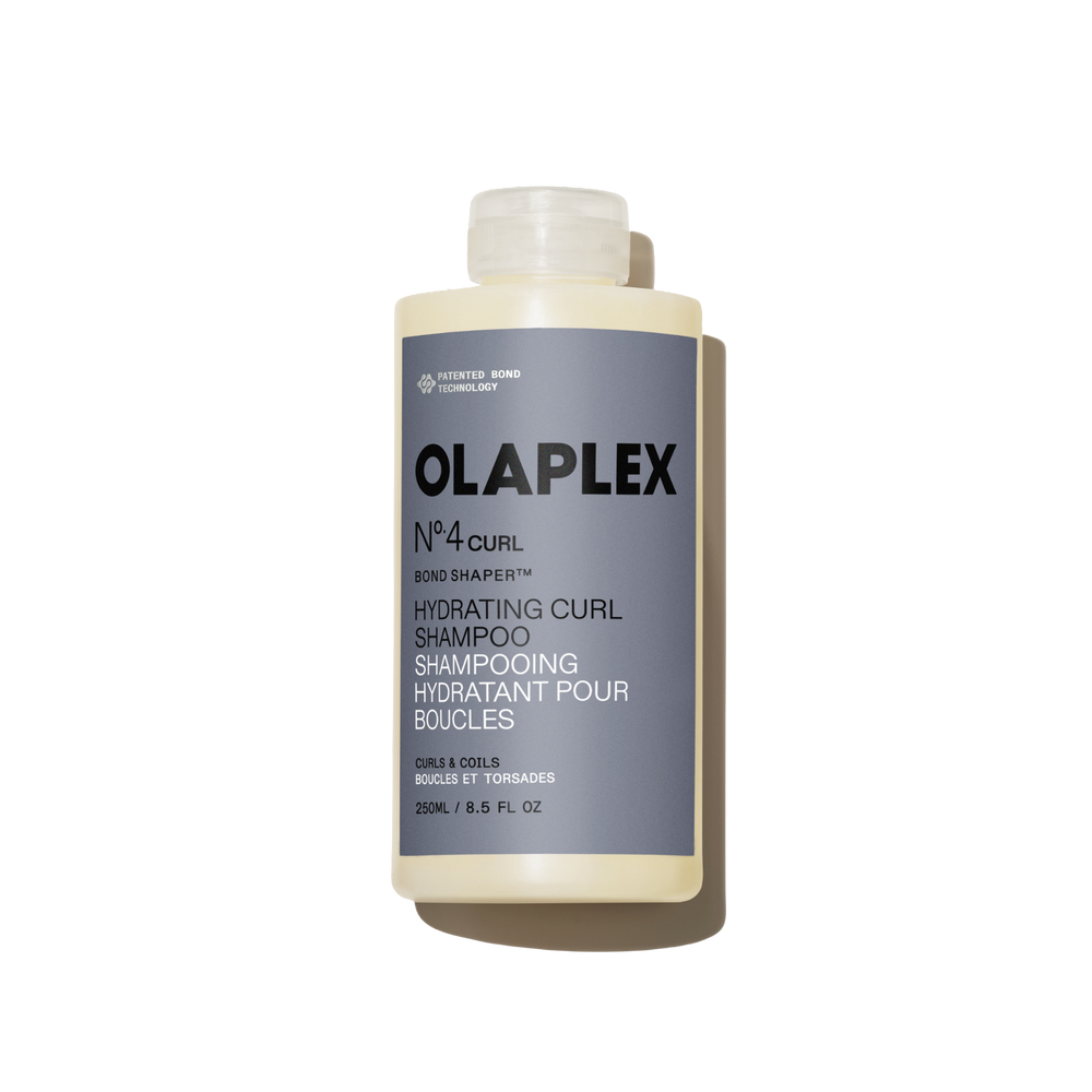 Flacone di Olaplex N°.4CURL Bond Shaper Hydrating Curl Shampoo da 250 ml su uno sfondo bianco neutro - main view