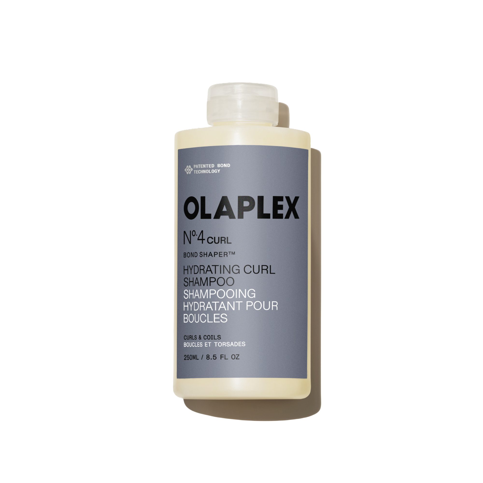 Flacone di Olaplex N°.4CURL Bond Shaper Hydrating Curl Shampoo da 250 ml su uno sfondo bianco neutro