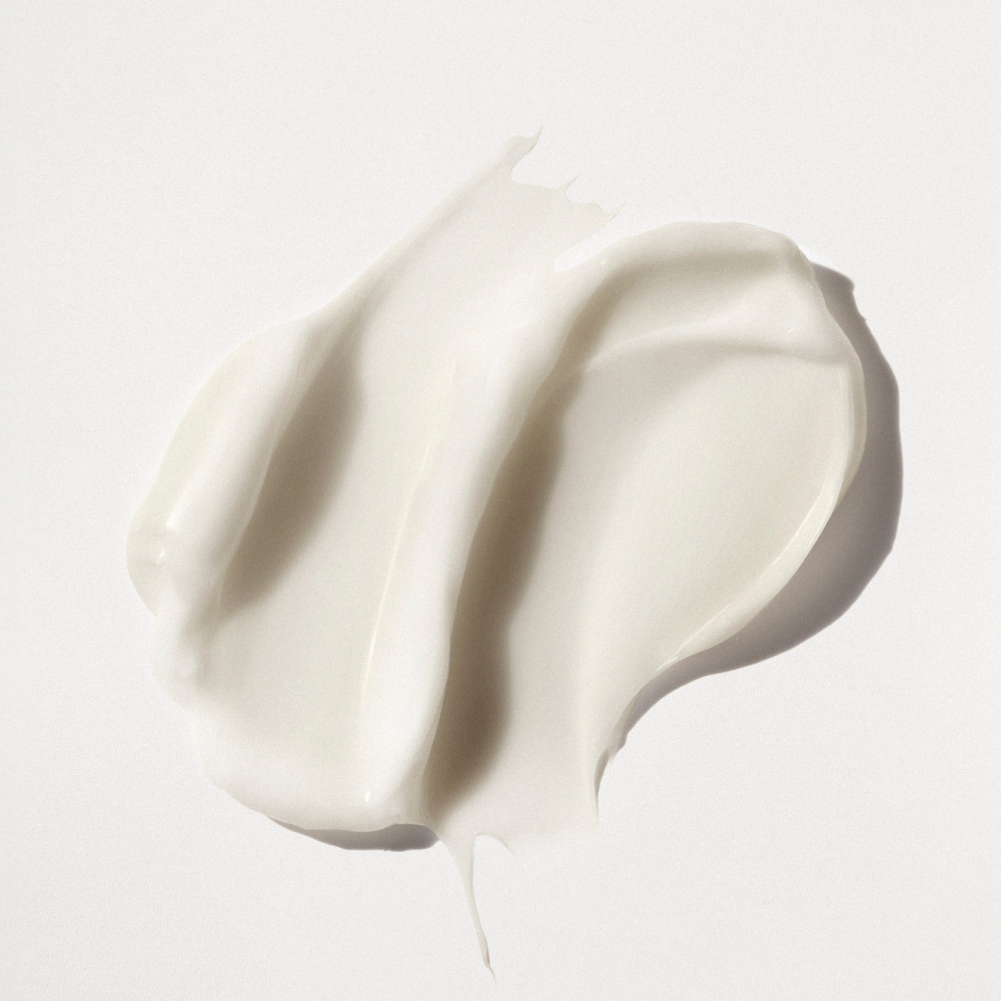 hover 

Un campione bianco, spesso e cremoso di OLAPLEX N°.5CURL Hydrating Curl Conditioner che mostra una texture liscia e ricca su uno sfondo grigio chiaro.