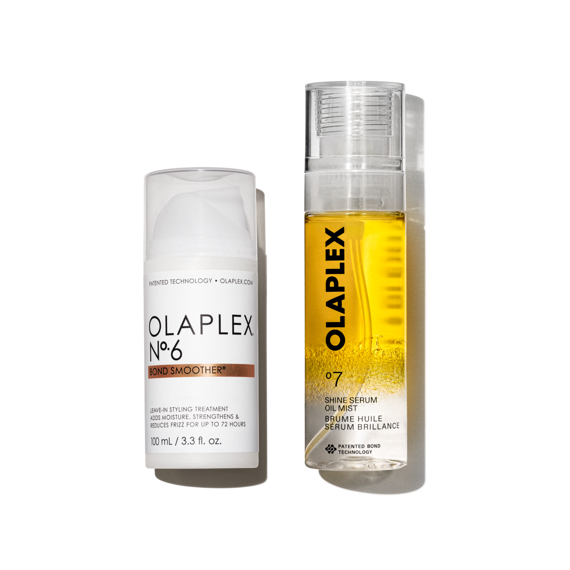 Due prodotti per capelli Olaplex sono affiancati su uno sfondo bianco e pulito. A sinistra c'è Olaplex No.6 Bond Smoother, un flacone bianco con dosatore e tappo trasparente. A destra c'è un flacone leggermente più alto di Olaplex No.7 Shine Serum Oil Mist, un flacone spray trasparente che lascia intravedere al suo interno un liquido di un vivace giallo dorato. Entrambi i flaconi presentano il classico design minimalista del marchio con scritte nere ben definite.
