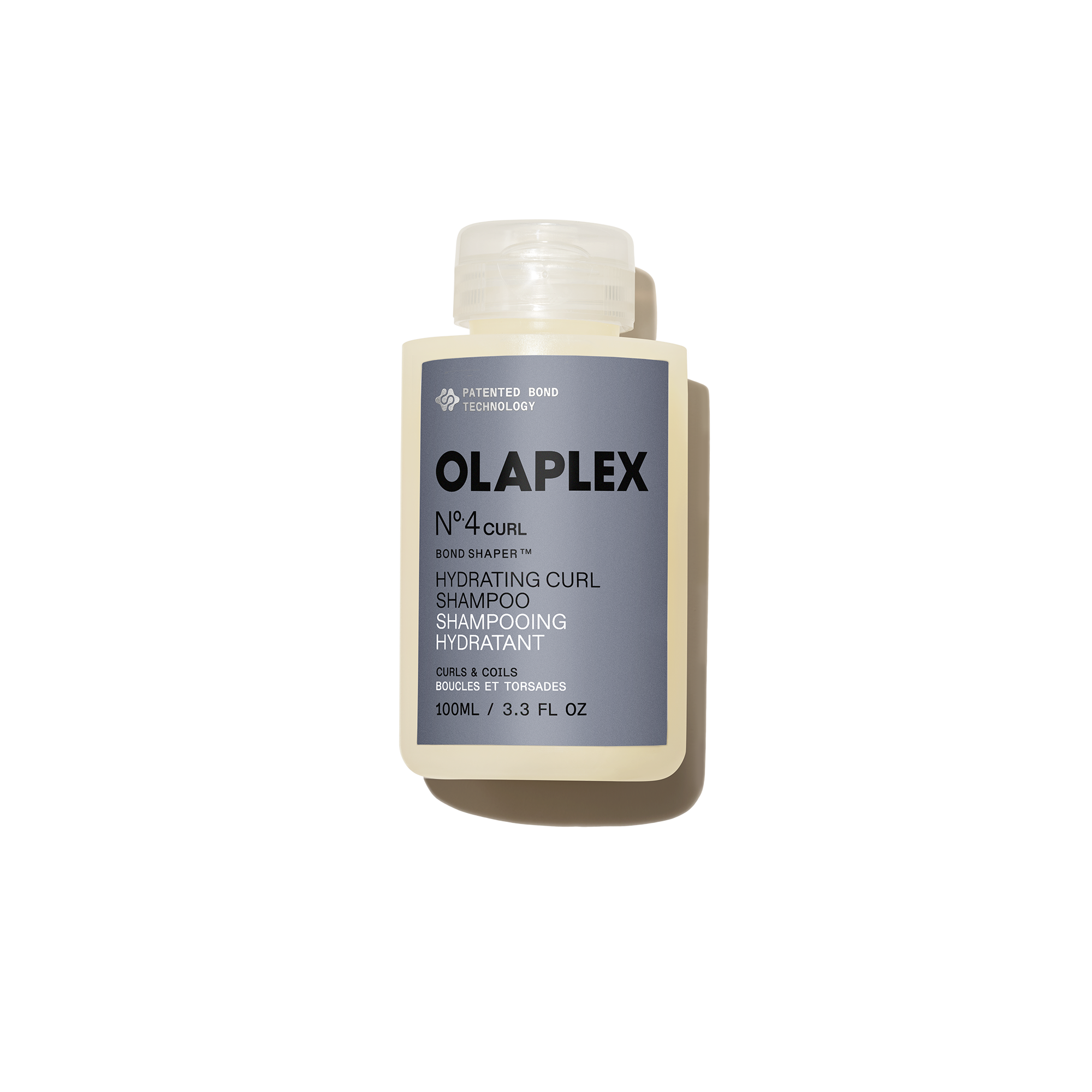 Flacone di Olaplex Nº.4CURL Bond Shaper Hydrating Curl Shampoo da 100 ml su uno sfondo bianco neutro