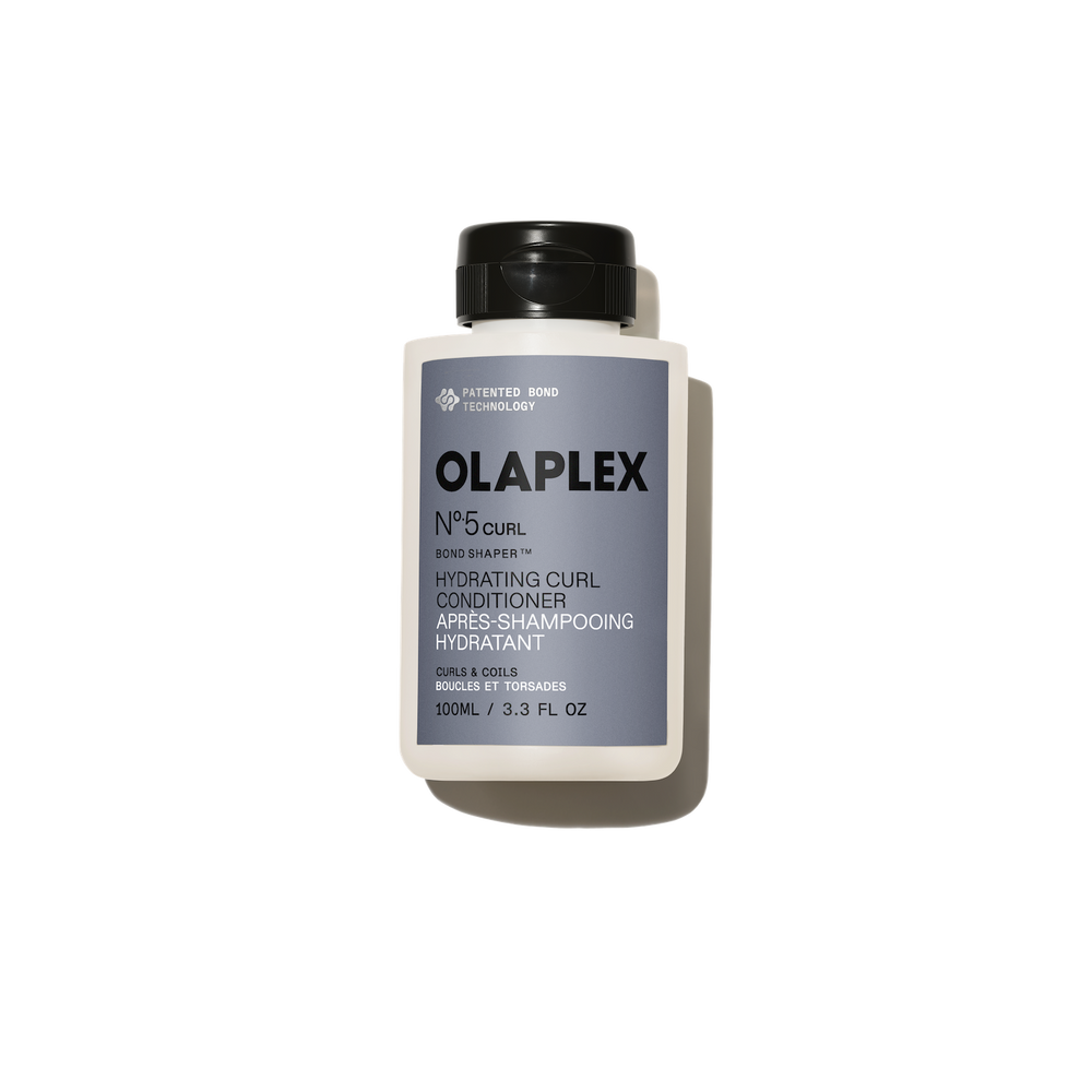 hover 

Un campione bianco, spesso e cremoso di OLAPLEX N°.5CURL Hydrating Curl Conditioner che mostra una texture liscia e ricca su uno sfondo grigio chiaro. - alternate view
